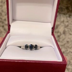 10k white gold and 3 stone sapphire ring.